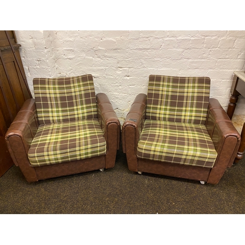 493 - Pair of Mid Century Brown Vinyl Button Side Club Chairs on Casters, small splits on the arms