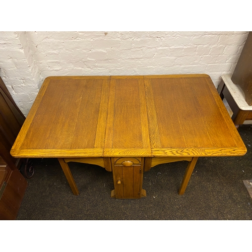 495 - Heavy Drop Leaf Dining Table with Twin Fold out Legs, Side Drawer and Cupboard