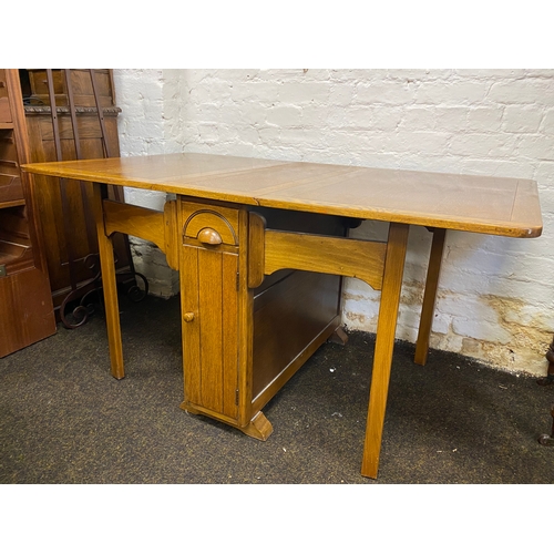 495 - Heavy Drop Leaf Dining Table with Twin Fold out Legs, Side Drawer and Cupboard