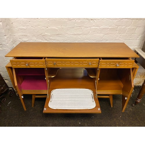 496 - Heavy Stylish Mid Century Drinks Cabinet / Sideboard by Beautility with Sword and Ship Accents