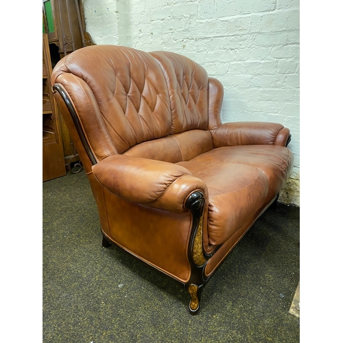 500 - Stylish Brown Leather Sofa with Veneered Wood Accents