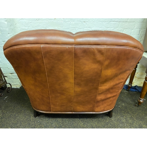 500 - Stylish Brown Leather Sofa with Veneered Wood Accents