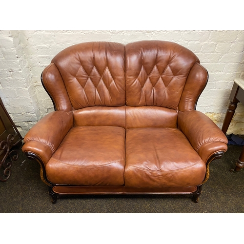 500 - Stylish Brown Leather Sofa with Veneered Wood Accents