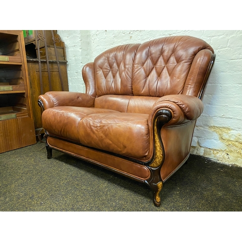 500 - Stylish Brown Leather Sofa with Veneered Wood Accents