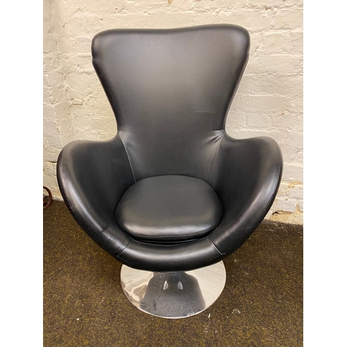 508 - Black Leather Swivel Armchair, damage to back