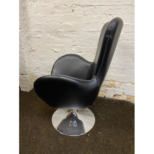 508 - Black Leather Swivel Armchair, damage to back