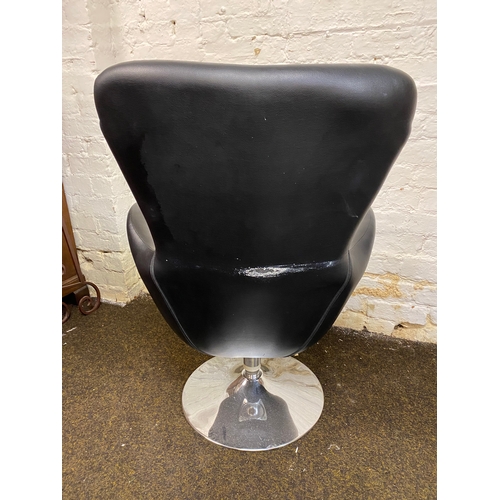 508 - Black Leather Swivel Armchair, damage to back