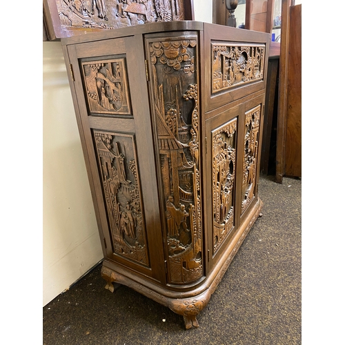 517 - Heavily Carved and Polished Oriental Wooden Drinks Cabinet