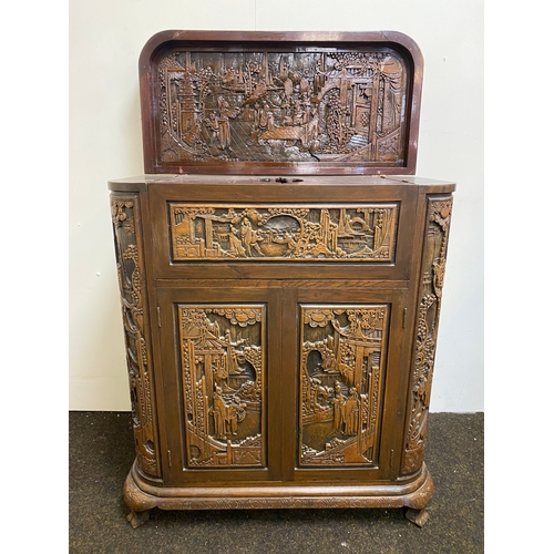 517 - Heavily Carved and Polished Oriental Wooden Drinks Cabinet