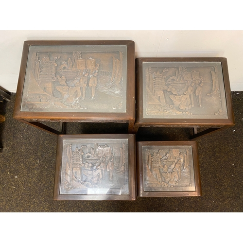 522 - Set of 4 Heavily Carved Wooden Oriental Stacking Tables with Glass Tops