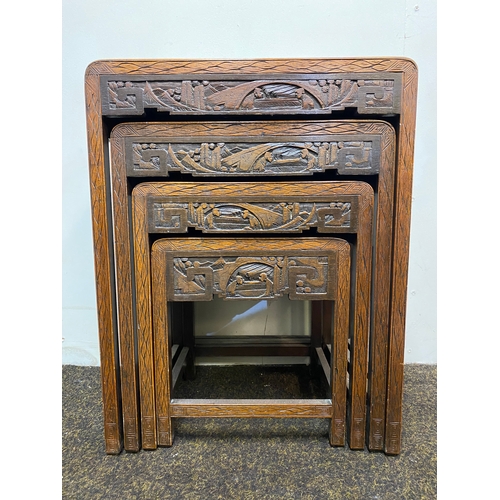 522 - Set of 4 Heavily Carved Wooden Oriental Stacking Tables with Glass Tops