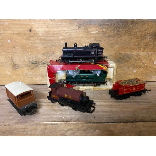 57 - Eleven Tri-ang / Hornby Locomotives and Carriages, one is boxed