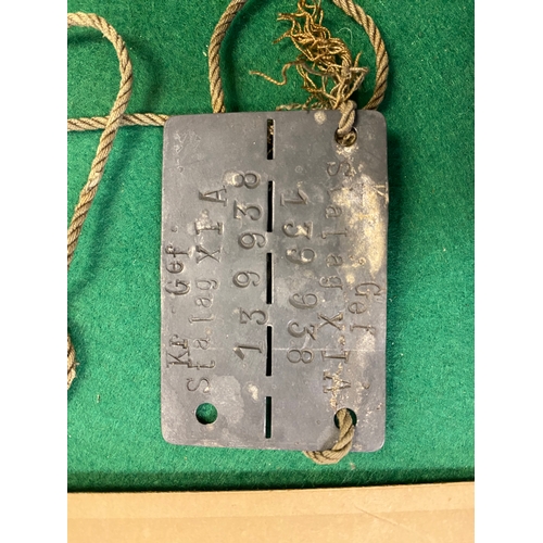 104 - WWII Prisoner of War 'Stalag' Dogtag with Accompanying Photograph. Article is stamped:
Kr Gef Stalag... 