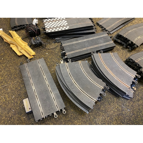 118 - Large Lot of Scalextric Track with Controllers and Power Supply Unit