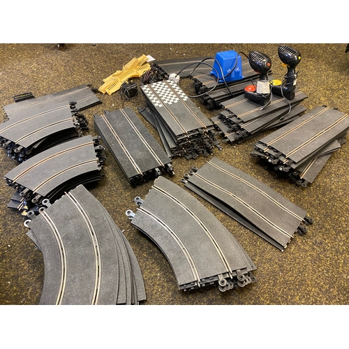 118 - Large Lot of Scalextric Track with Controllers and Power Supply Unit