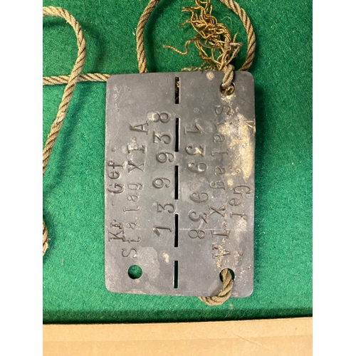 133 - WW2 Prisoner of War Dogtag and Photograph, we believe the photo to be of the individual in question.