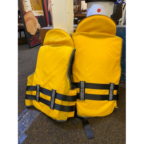 154 - Pair of Hutchwilco Life Jackets (sizes S and L)