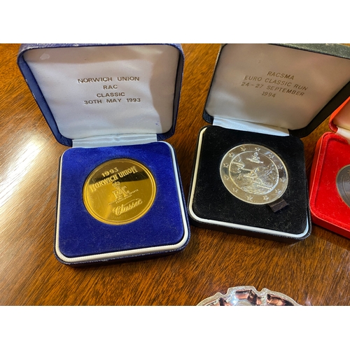 237 - 6x Boxed Driving Medallions with 2x Motoring Show Metal Trays