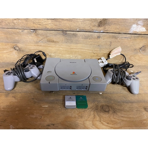 308 - Sony Playstation with Leads, 2x Controllers & Memory Cards