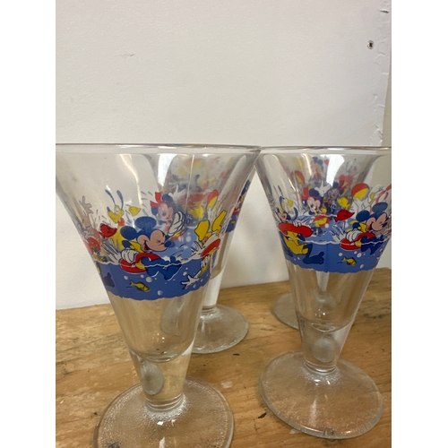 64 - Set of 4 collectable Disney glasses