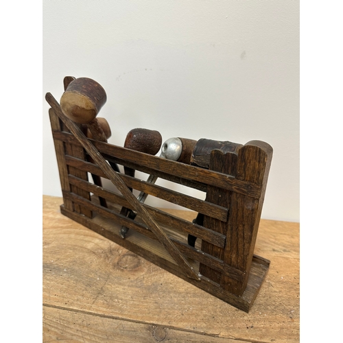 105 - Vintage pipe rack includes 5 vintage pipes