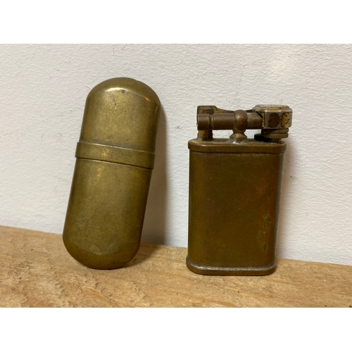 141 - Pair of WW2 Comoy Lighters