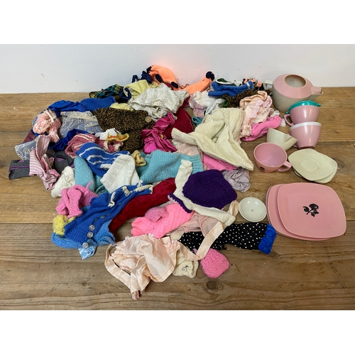 218 - Quantity of Dolls Clothing and part Dolls Teaset