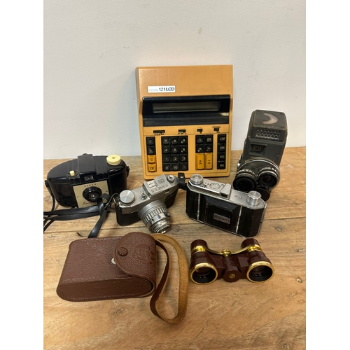 246 - Quantity of Vintage Cameras and a Calcul