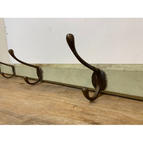 301 - C.1920’s Wall Mounted Cloak Room Hooks in Brass