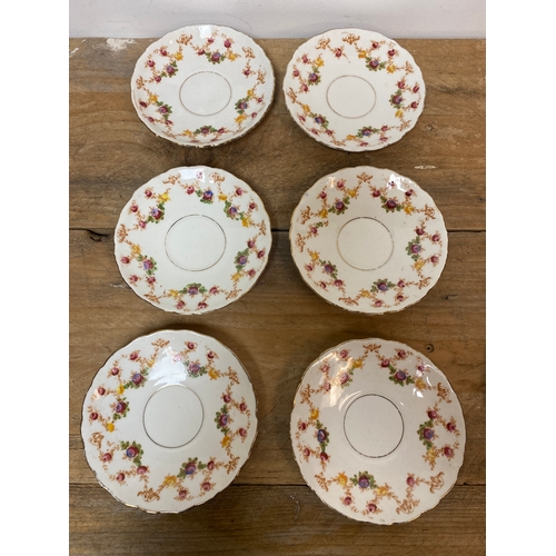 343 - Hand Painted Floral Part Ceramic Teaset with Wicker Basket