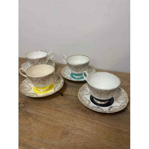 348 - Four Windsor Cups and Saucers