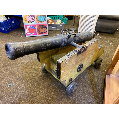 65 - Cast 45” Cannon on Wooden Cart, overall Length Approx. 55”