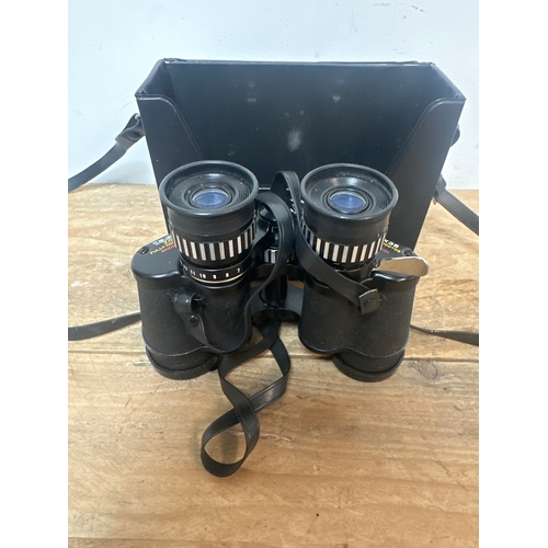 70 - Pair of Tasco zoom 7 x 15x35 binoculars with case