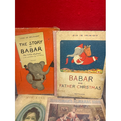 79 - Two 1940s Barbar children’s books a vintage calendar and a tin picture