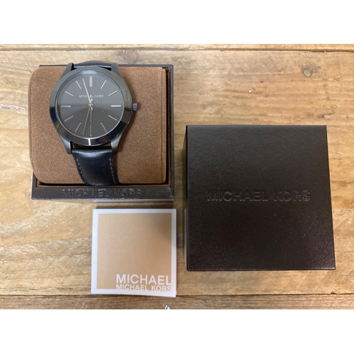 100 - Michael Kors Black Wristwatch with Leather Strap and Box, working order