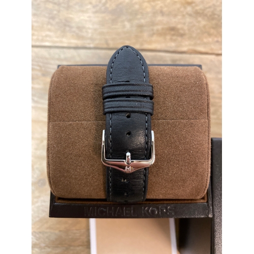 100 - Michael Kors Black Wristwatch with Leather Strap and Box, working order