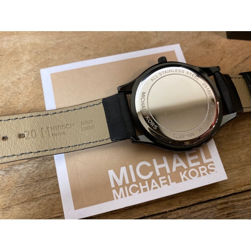 100 - Michael Kors Black Wristwatch with Leather Strap and Box, working order