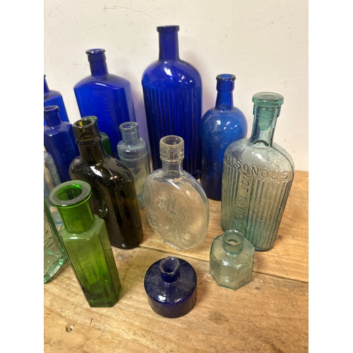 117 - Collection of 18 antique glass bottles