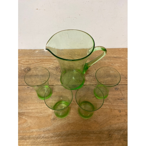 134 - Mid Century Green Glass Pitcher with Four Glasses