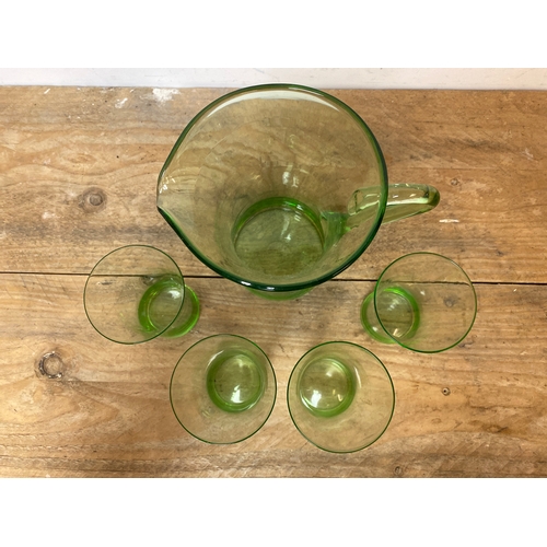 134 - Mid Century Green Glass Pitcher with Four Glasses