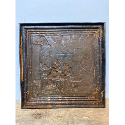 154 - Cast Iron 17.5” Fire Back featuring Tavern Scene