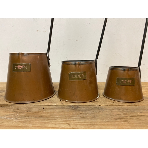 181 - Set of Three Graduated Copper Cider Measures, English c19th Century