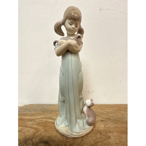 198 - Lladro girl figurine with two cats