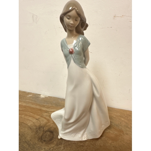 205 - NAO Figurine of a young lady