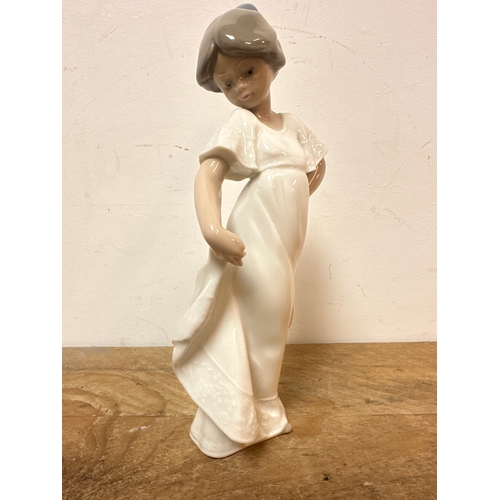 206 - NAO figurine of a young girl