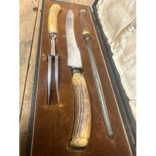 244 - Bone handled carving set by Walker and Hall Sheffield