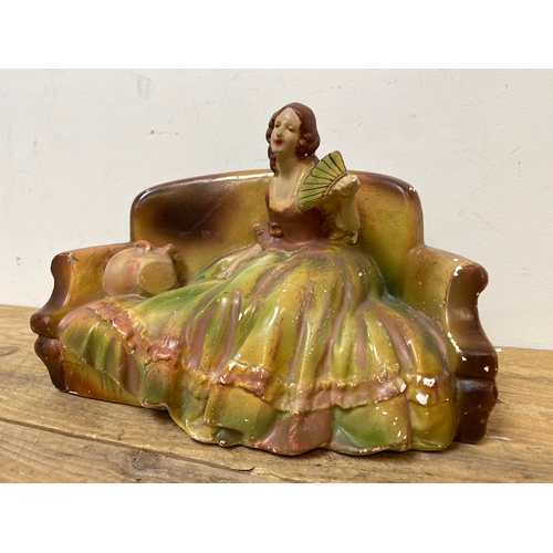 249 - Painted Plaster Figure of a seated Lady