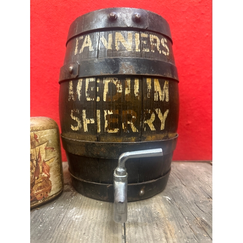 265 - Vintage oak Tanners sherry barrel and a old gin bottle with leather cover show a picture of old ship... 