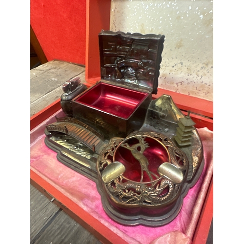 277 - Oriental smokers music box ashtray and lighter display working order.