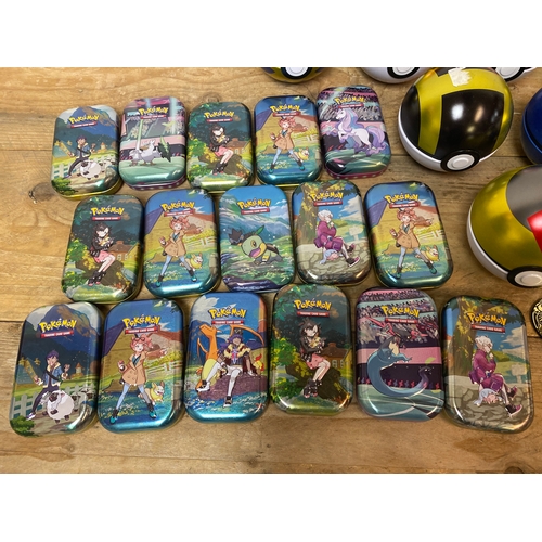 278 - Large Quantity of Collectible Pokémon Tins Including Pokeballs and Coins